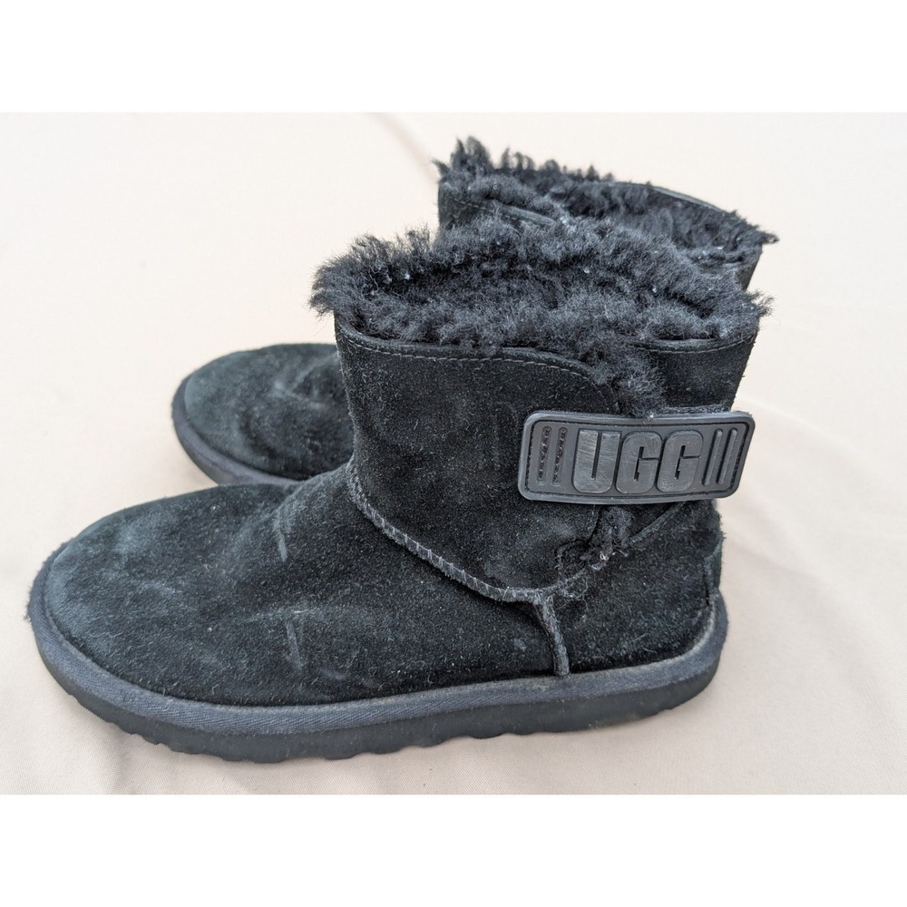 UGG LOGO STRAP MINI SUEDE SHEARLING LINED ANKLE BOOTS BLACK 7